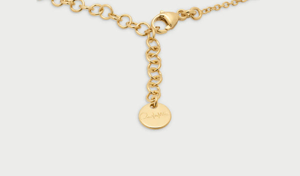 cosa è un punzone? questa immagine mostra una bollatina o punzone che è quella parte del gioiello dove vengono indicati i materiali utilizzati per la realizzazione, leggendo il punzone puoi capire se è oro 18kt o argento 925