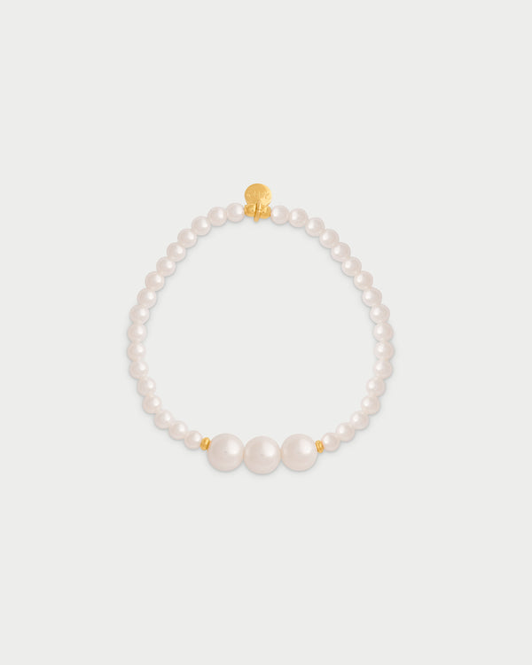 Pulsera elástica tres perlas centrales - WHITESIDE