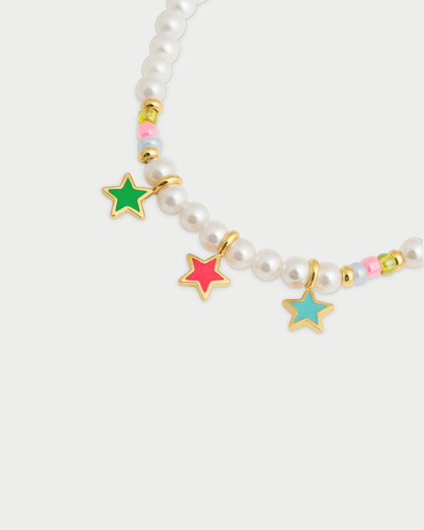 Pulsera elástica con perlas con tres estrellas esmaltadas - ColorFUN