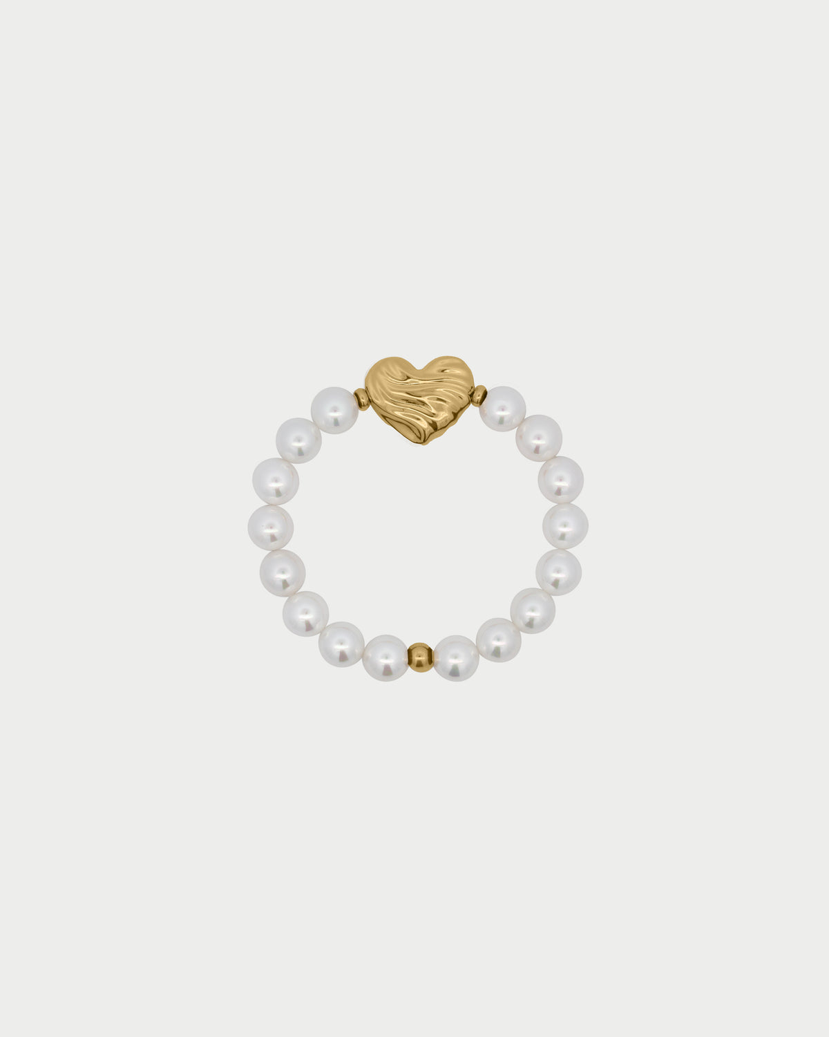 Pulsera de perlas con forma de corazón atrevido