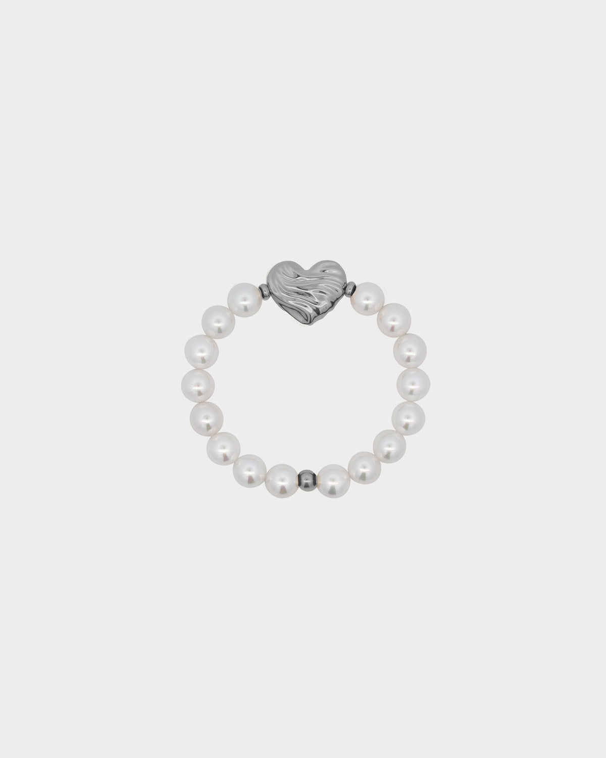 Pulsera de perlas con forma de corazón atrevido