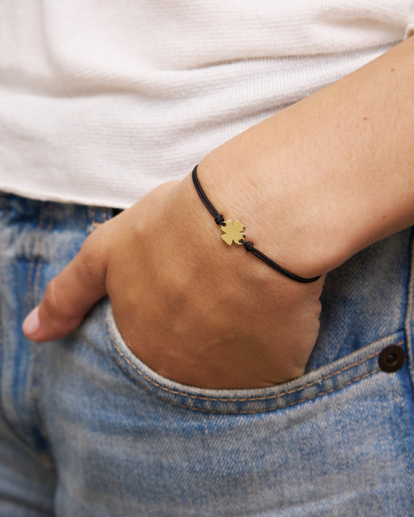 Pulsera de tela negra 1 sujeto trébol de cuatro hojas