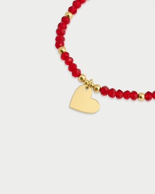 Pulsera elástica con micro piedras y colgante corazón