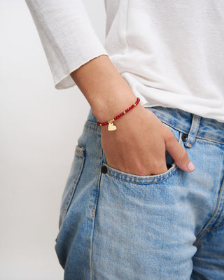 Elastic bracelet with micro stones and heart pendant