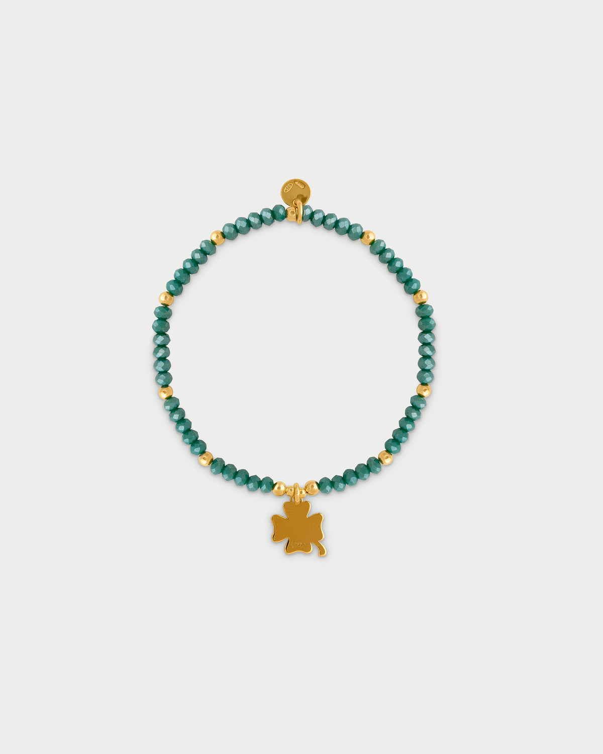 Pulsera elástica con micro piedras y colgante trébol de cuatro hojas