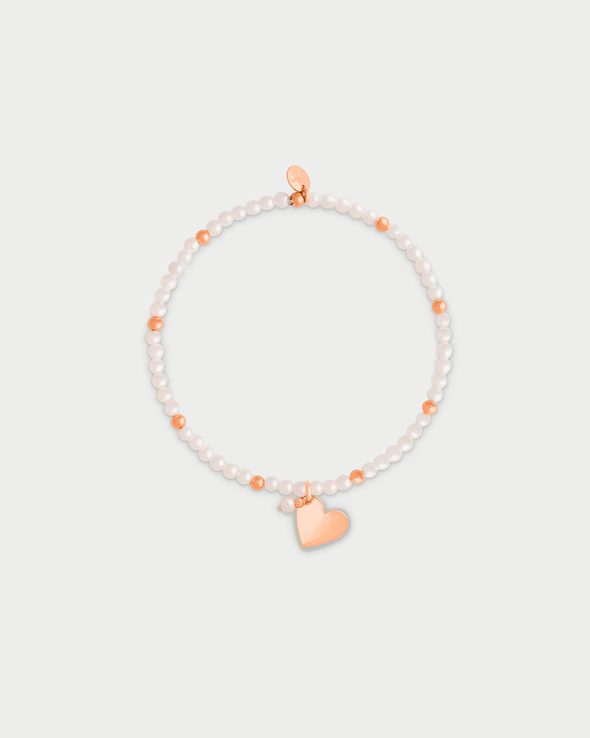 Pulsera elástica con perlas y bolitas - CORAZON