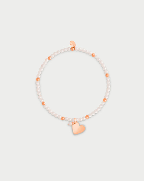 Pulsera elástica con perlas y bolitas - CORAZON