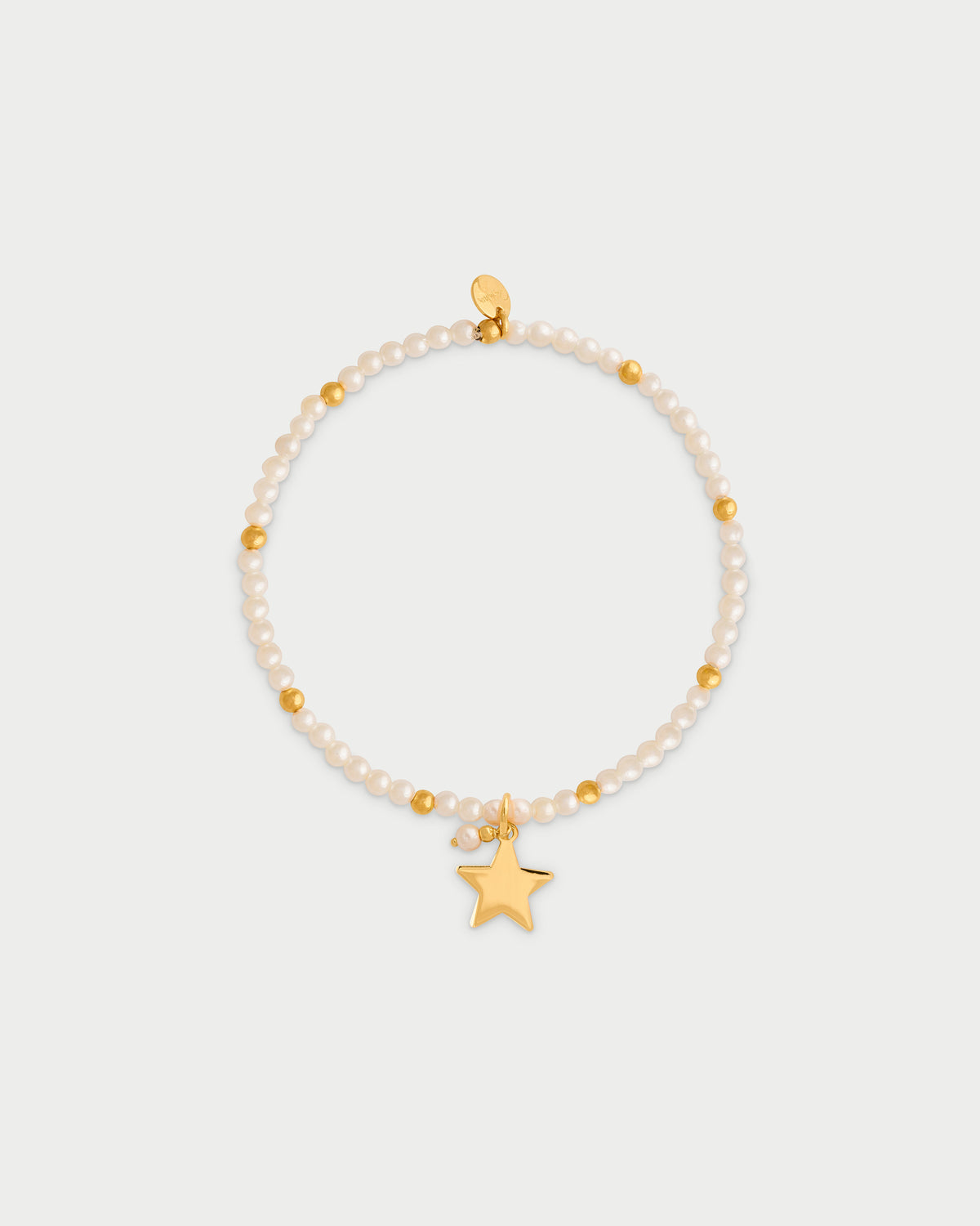 Pulsera elástica con perlas y bolitas - ESTRELLA