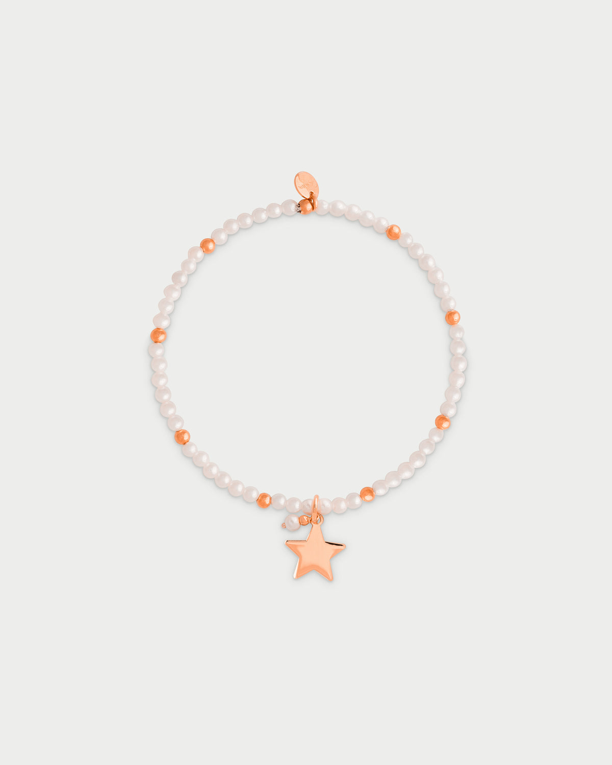Pulsera elástica con perlas y bolitas - ESTRELLA