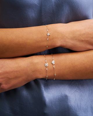 Bracelet with bezels and small pavé star subject - STRADUST TEN