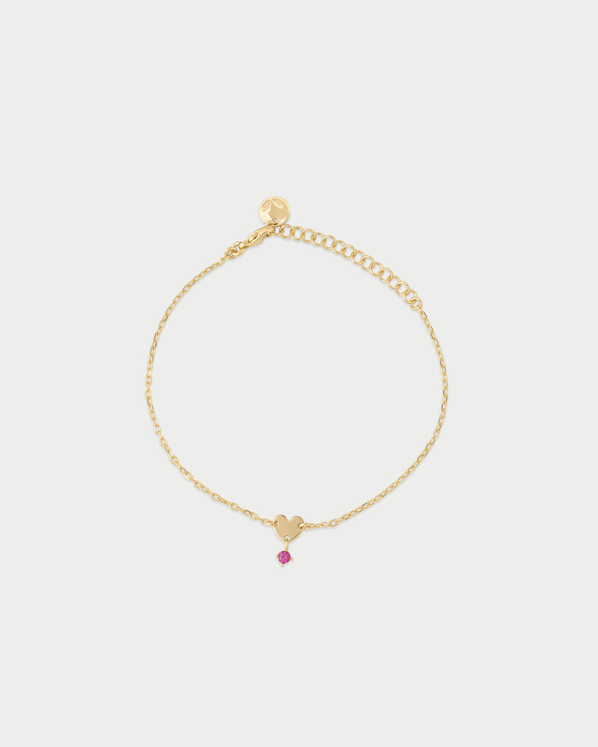 Pulsera mini corazón y punto de luz