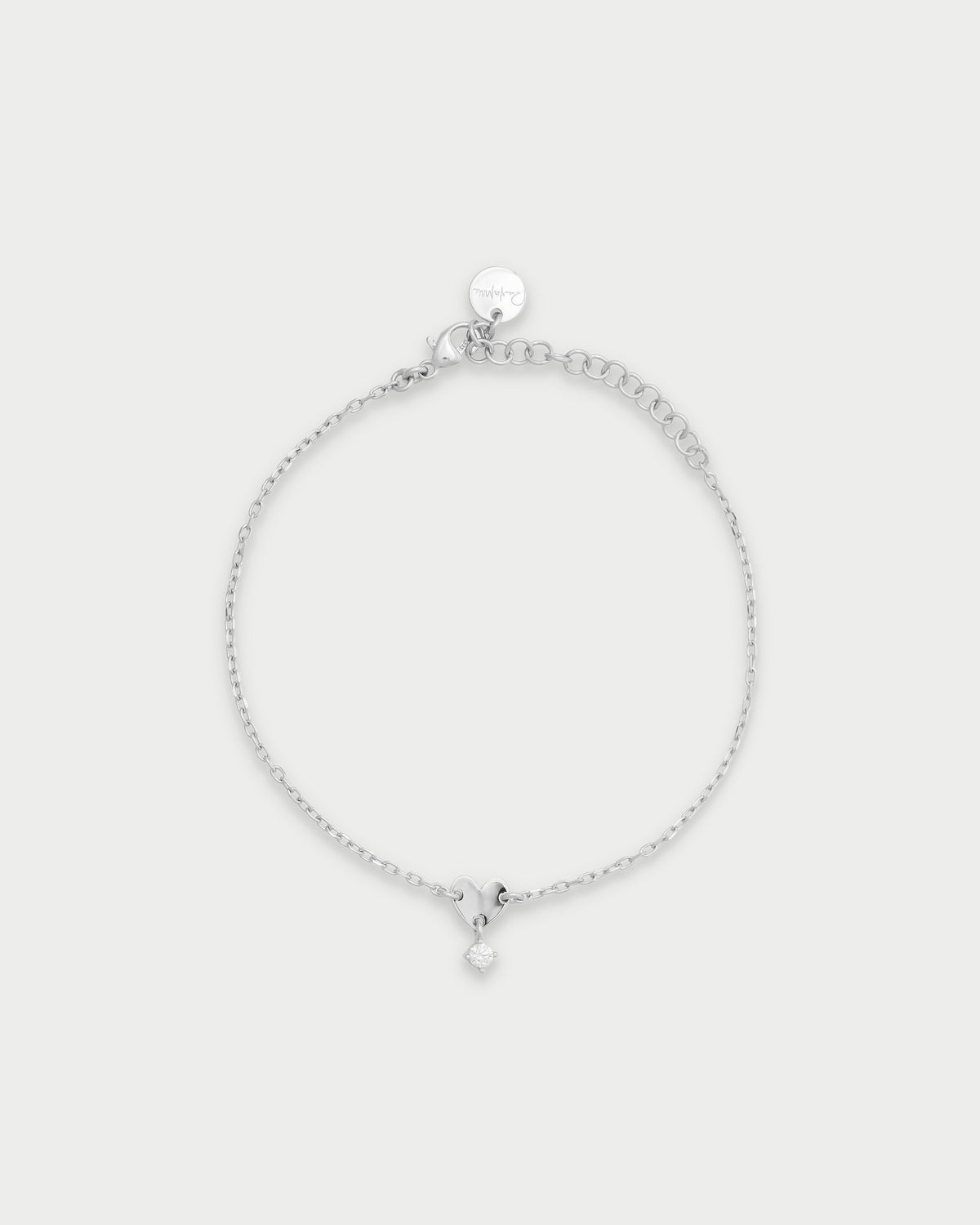 Bracciale mini cuore e punto luce