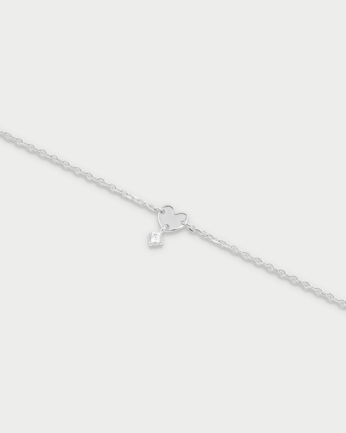 Bracciale mini cuore e punto luce