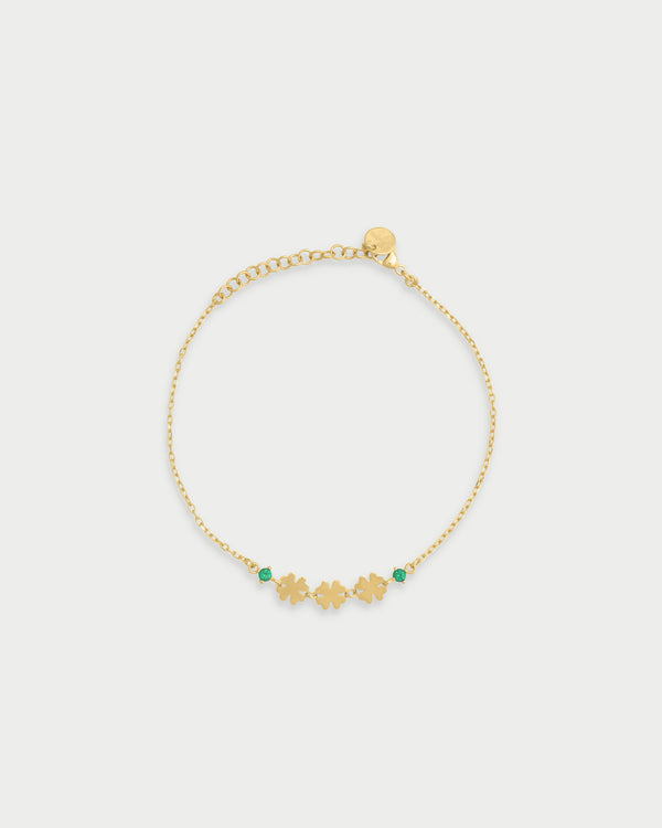 Pulsera con tres treboles y punto de luz