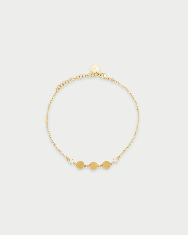 Pulsera con tres discos y punto de luz