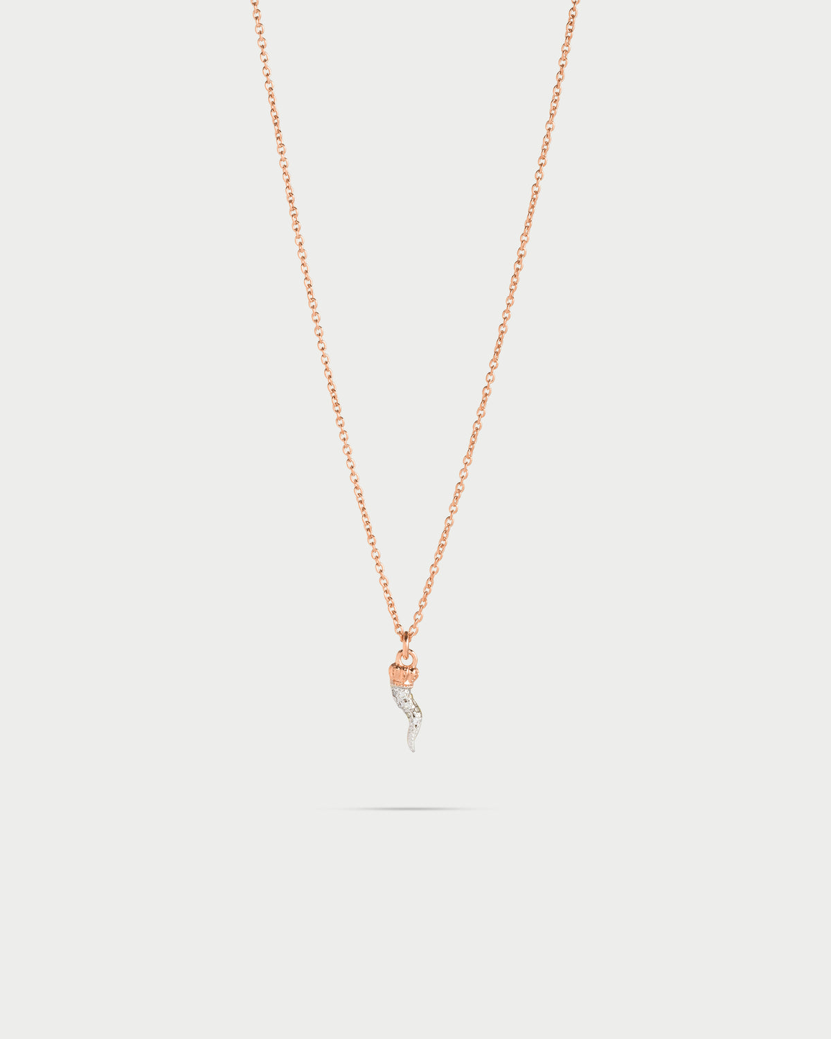 Choker chain and horn zircons