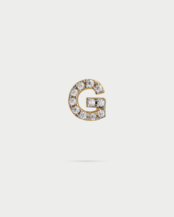 Single lobe earring with letter and white zircons