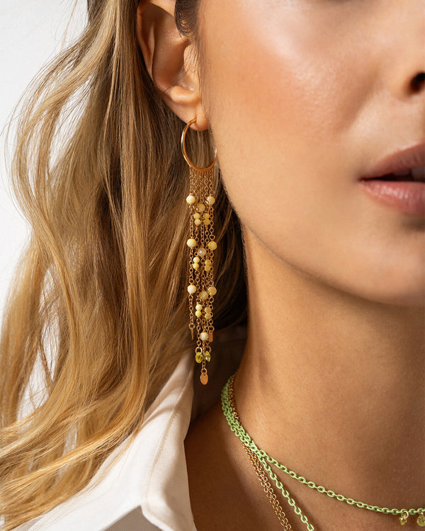 Single hoop earring with chains and pendants