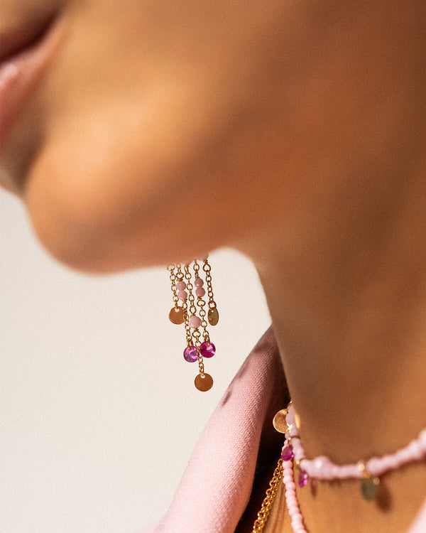 Single hoop earring with chains and pendants